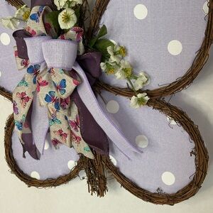 Decorative Butterfly Wreath Accent in Lavender and Purple. 23 inches wide
